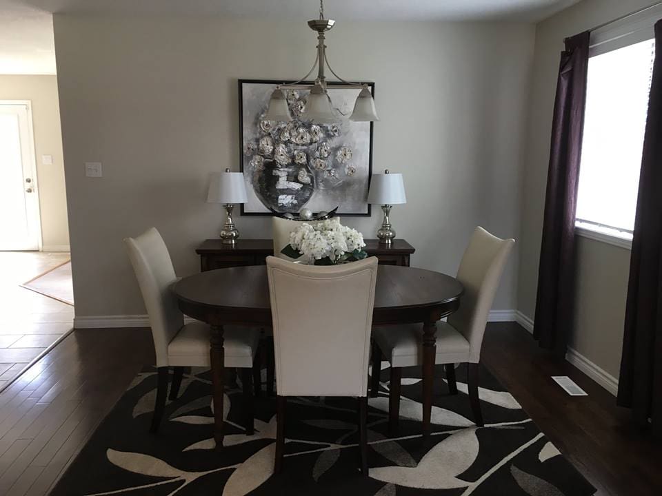 Picture of dining after | A staged living room rich in blues | MatiDesign Interior Decorating And Home Staging London Ontario