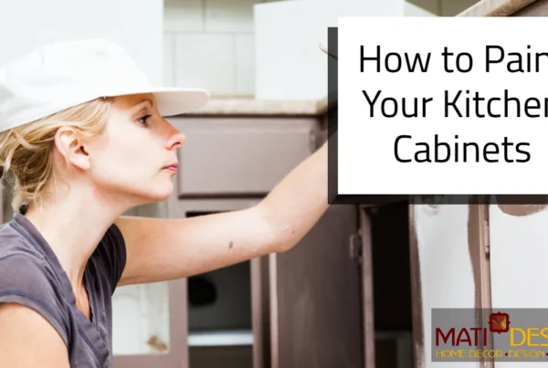 a blonde woman with light skin painting kitchen cabinets | How to Paint Your Kitchen Cabinets | Mati Design London Ontario
