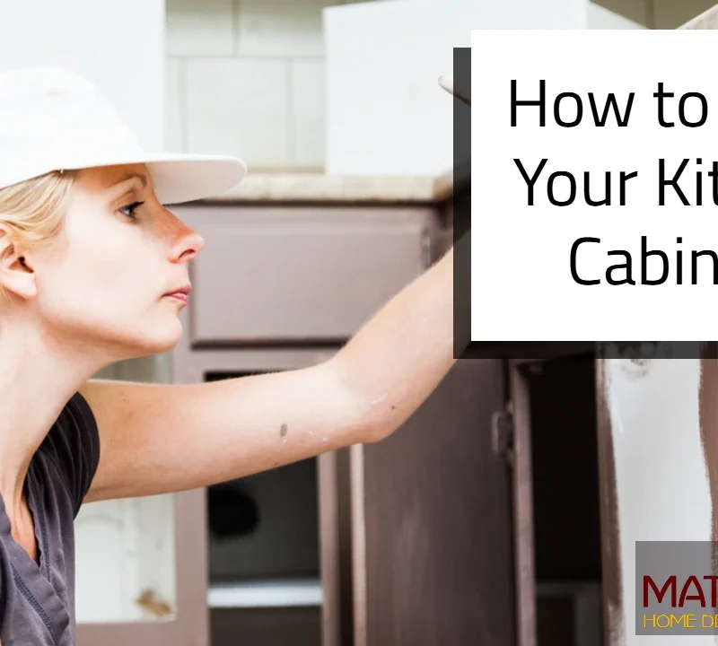 a blonde woman with light skin painting kitchen cabinets | How to Paint Your Kitchen Cabinets | Mati Design London Ontario