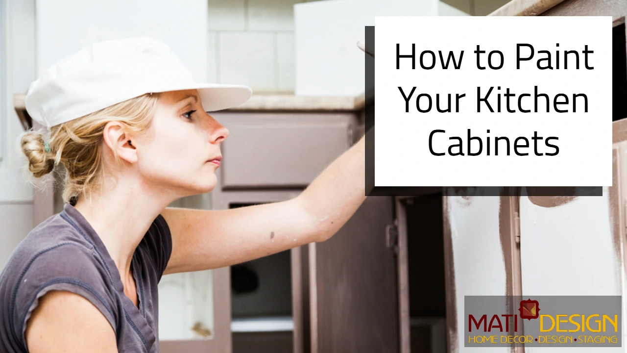 a blonde woman with light skin painting kitchen cabinets | How to Paint Your Kitchen Cabinets | Mati Design London Ontario